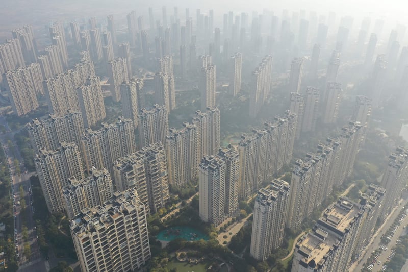 China's largest developer Country Garden Holdings reported a 96 percent drop in earnings, the latest grim illustration of the economic chaos coursing through the country's property sector. AFP