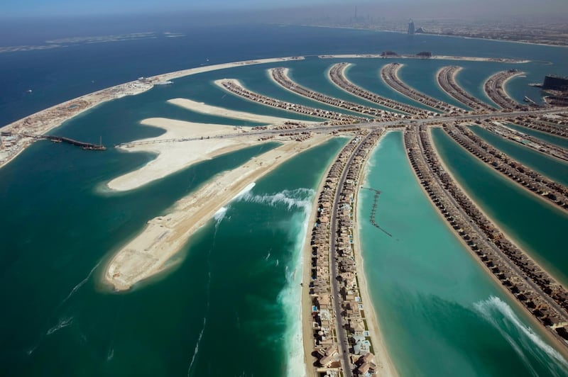 An aerial view of The Palm Island Jumeirah in Dubai and some residential homes that have been completed, November 8, 2007. REUTERS/Steve Crisp (UNITED ARAB EMIRATES)   FOR BEST QUALITY IMAGE: ALSO SEE GF2E5830Z1T01