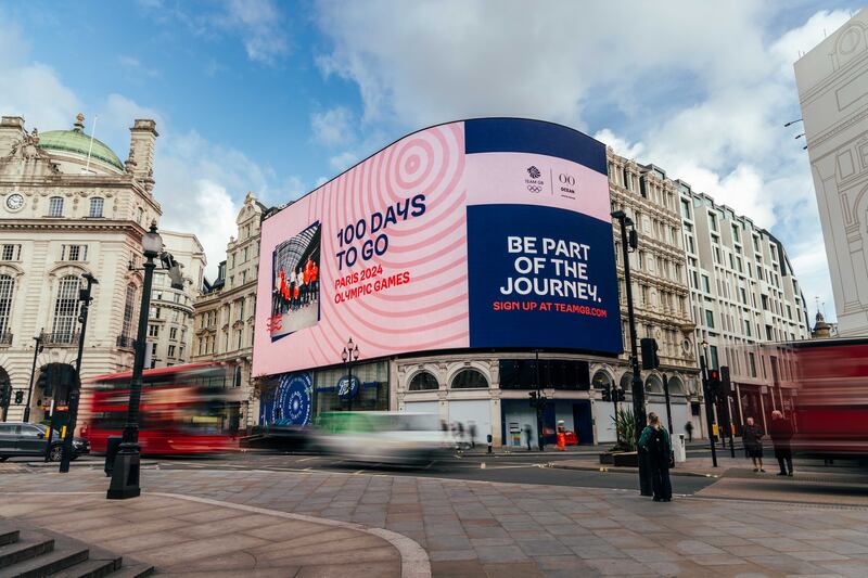 The big screens at Piccadilly Circus in London marking 100 days to go before the Games begin. PA