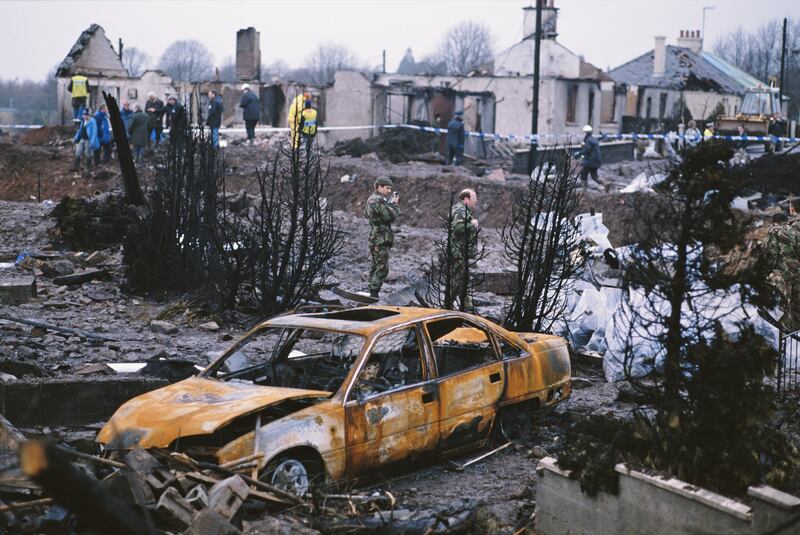 December 1988: Some of the destruction caused by Pan Am Flight 103 after it crashed onto the town of Lockerbie in Scotland, on 21st December 1988. The Boeing 747 'Clipper Maid of the Seas' was destroyed en route from Heathrow to JFK Airport in New York, when a bomb was detonated in its forward cargo hold. All 259 people on board were killed, as well as 11 people in the town of Lockerbie. (Photo by Bryn Colton/Getty Images)