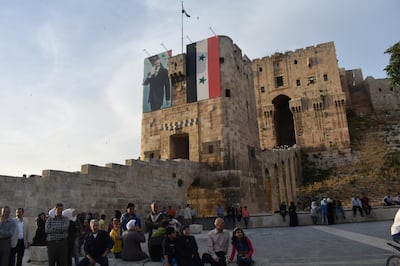 The Citadel of Aleppo, adorned with poster of President Al Assad. Gareth Browne / The National