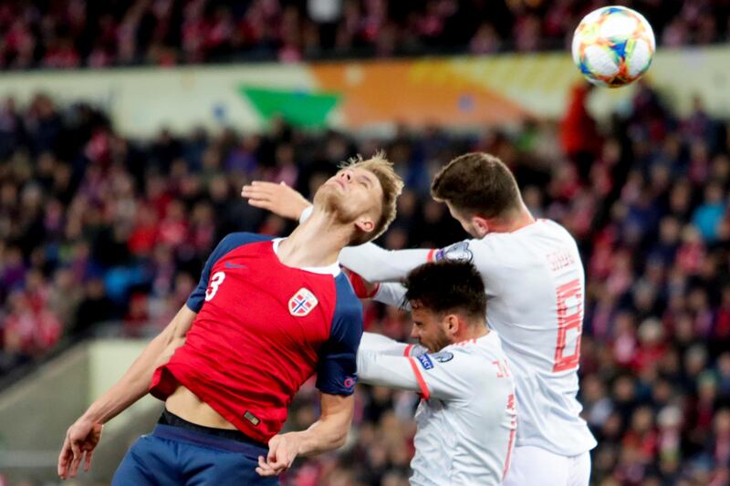 Soccer Football - Euro 2020 Qualifier - Group F - Norway v Spain - Ullevaal Stadium, Oslo, Norway. Norway's Kristoffer Ajer fights for the ball against Spain's Saul Niguez. REUTERS