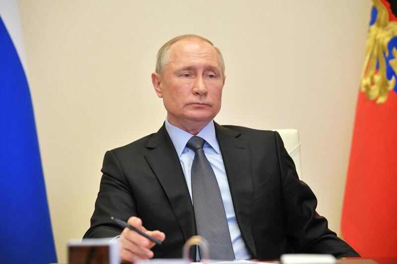 epa08360960 Russian President Vladimir Putin attends a meeting on the situation with the spread of the COVID-19 disease caused by the SARS-CoV-2 coronavirus in Russia, via teleconference call at Novo-Ogaryovo state residence, outside Moscow, Russia, 13 April 2020.  EPA/ALEXEI DRUZHININ / KREMLIN POOL/SPUTNIK / POOL MANDATORY CREDIT
