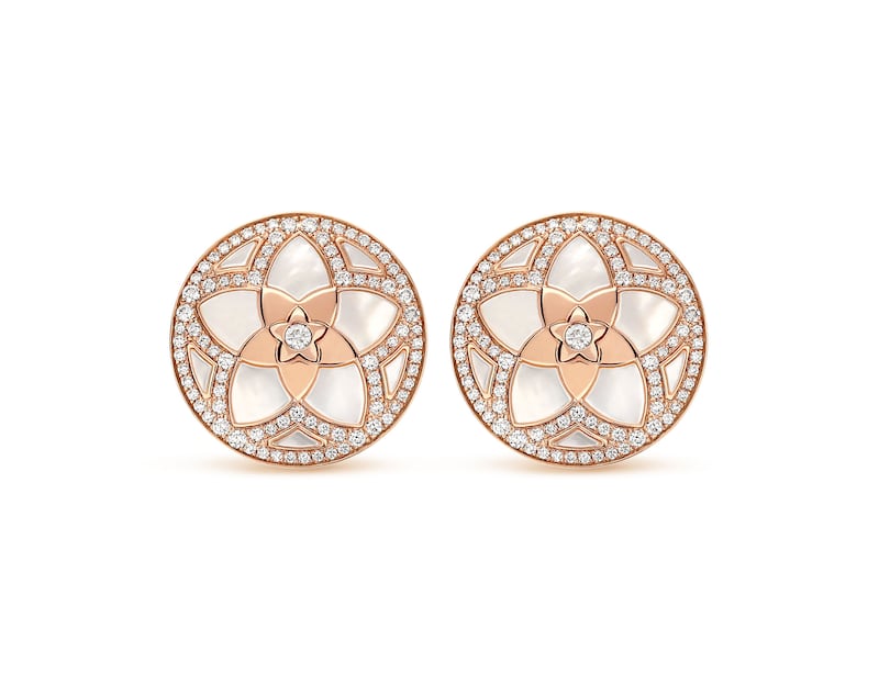 Stud earrings inlaid with the five-petal flower motif that defines the new Jannah collection. Photo: Bulgari