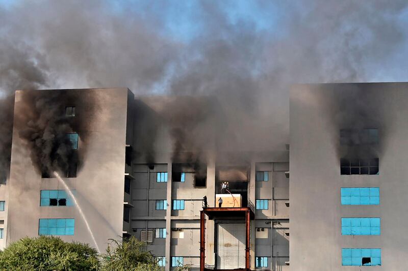Firefighters try to control a fire that broke out at India's Serum Institute in Pune. AFP