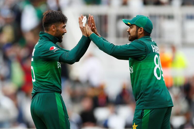 Pakistan's Mohammad Amir celebrates with Haris Sohail. Reuters