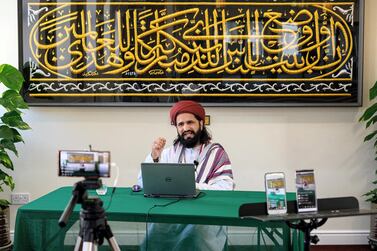 Imam Hassanat Ahmed delivers his Friday broadcast entitled 'Preparing for a Unique Ramadan' via multiple social media platforms from the otherwise empty Noor Ul Islam Mosque on April 24, 2020, the day before Ramadan commenced in the UK. AFP