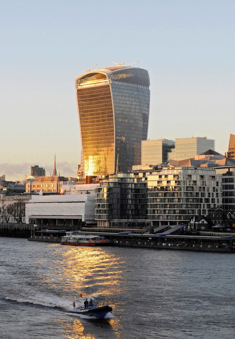 England, London, The Modern skyline of the City with The Walkie Talkie building with sunlight reflected in the River Thames. (Photo by: Eye Ubiquitous/UIG via Getty Images)