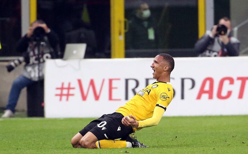 Udinese's Rodrigo Becao celebrates after scoring against AC Milan. EPA