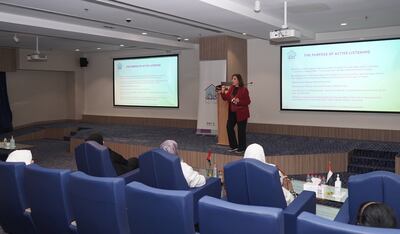 Dr Bana Bouzaboon, mental health director at Kanaf, leads the presentation. Photo: Kanaf

