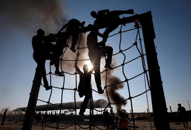 Palestinian cadets demonstrate their skills at a police college run by the Hamas-led interior ministry, in Khan Younis in the southern Gaza Strip. Reuters