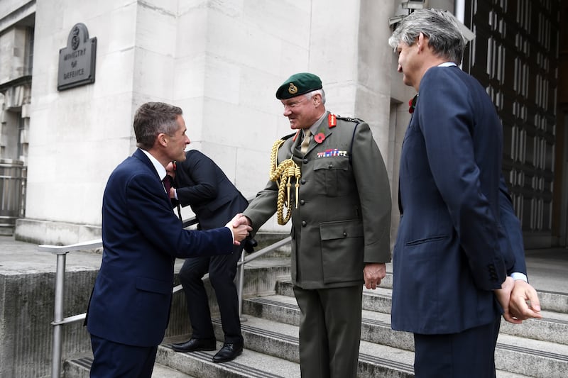 Gavin Williamson is greeted by Vice Chief of the Defence Staff Gordon Messenger as he arrives at the Ministry of Defence after his appointment as defence secretary in November 2017. Getty Images