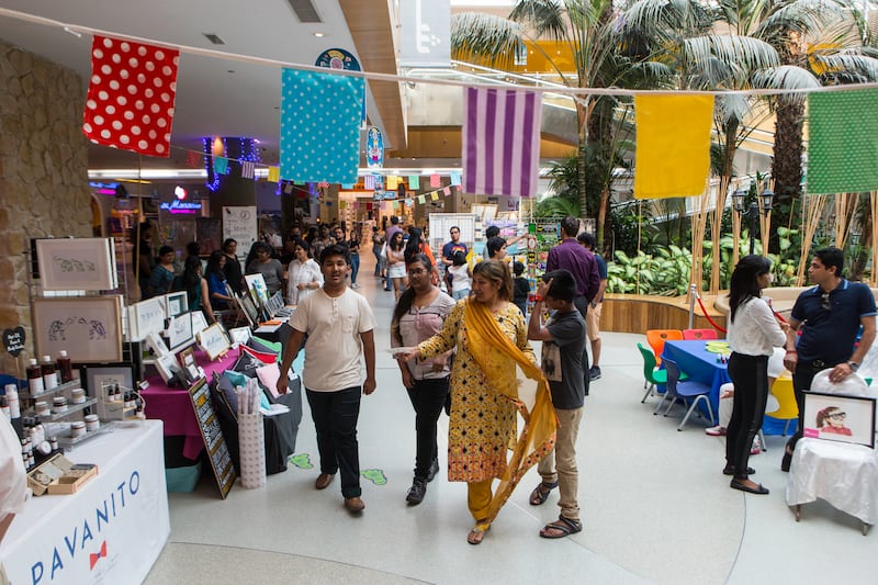 Dubai, United Arab Emirates, June 23, 2017:     People walk through the pre-Eid ArtE Makers Market at Times Square Centre in Dubai on June 23, 2017. The market which features local sellers with their locally made products on the second and fourth Friday of each month. Christopher Pike / The National

Job ID: 97926
Reporter:  N/A
Section: News
Keywords: 