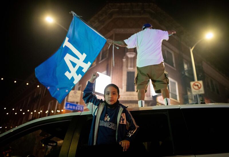 Los Angeles Dodgers fans celebrate. EPA