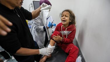 A Palestinian child injured in Israeli air strikes arrives at Kuwait Hospital for treatment last month in Rafah, Gaza. Getty Images