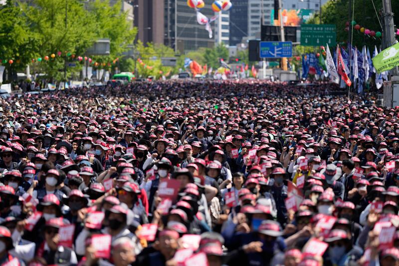 Members of the Korean Confederation of Trade Unions attend a rally for better pay and conditions on May Day in Seoul, South Korea. AP