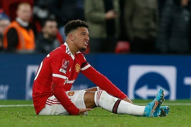 Soccer Football - FA Cup Fourth Round - Manchester United v Middlesbrough - Old Trafford, Manchester, Britain - February 4, 2022 Manchester United's Jadon Sancho reacts after sustaining an injury REUTERS/Craig Brough