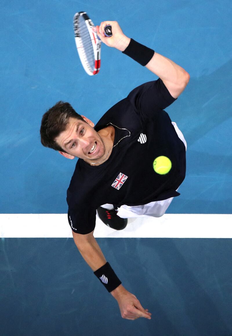 Britain's Cameron Norrie in action during his ATP Cup group stage match against Taylor Fritz of the US at the Sydney Olympic Park in Australia on Thursday,  January 6. Reuters