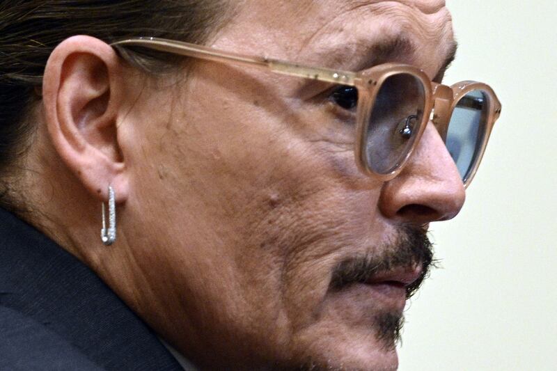 US actor Depp listens in the courtroom on April 26. Reuters