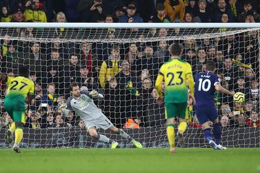 Harry Kane scores from the penalty spot at Carrow Road. Getty Images