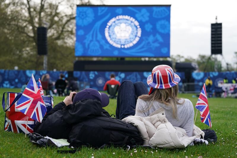 People begin to arrive in Hyde Park, where giant screens will show the coronation of King Charles III. Getty
