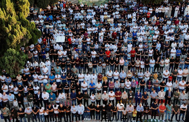 Palestinians at prayer in Al Aqsa compound on the first day of Eid. Muslims celebrate the holiday to mark the willingness of the Prophet Ibrahim (Abraham to Christians and Jews) to sacrifice his son. Reuters