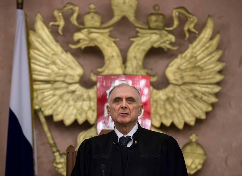 Russian Supreme Court judge Nikolai Romanenkov delivers a verdict in Moscow, Russia, Saturday, Dec. 30, 2017. Russia's highest court on Saturday upheld election officials' decision to bar opposition leader Alexei Navalny from running for president in March's election. (AP Photo/Alexander Zemlianichenko)