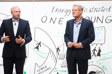 BP's outgoing CEO Bob Dudley (left) and chief economist Spencer Dale discuss the company's record on carbon emissions on stage at the One Young World Summit aimed at young leaders in London on Wednesday. EPA.  