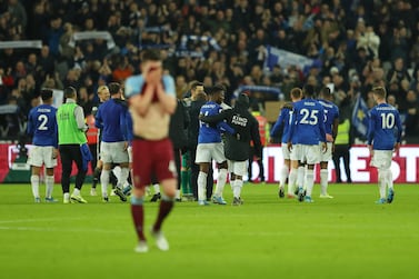 Leicester City players celebrate as Declan Rice of West Ham United looks dejected following the match at London Stadium. Getty Images