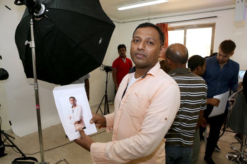 Kalpesh Patel from Gujarat, India, one of the Dubai workers who was photographed as part of GPP's Constructing Portraits initiative and exhibition. Pawan Singh / The National

