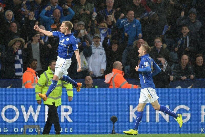 Leicester City's Marc Albrighton, left, celebrates scoring against Chelsea on Wednesday night in their 3-1 Premier League defeat. Oli Scarff / AFP / April 29, 2015emulation. No use in betting, games or single club/league/player publications.

