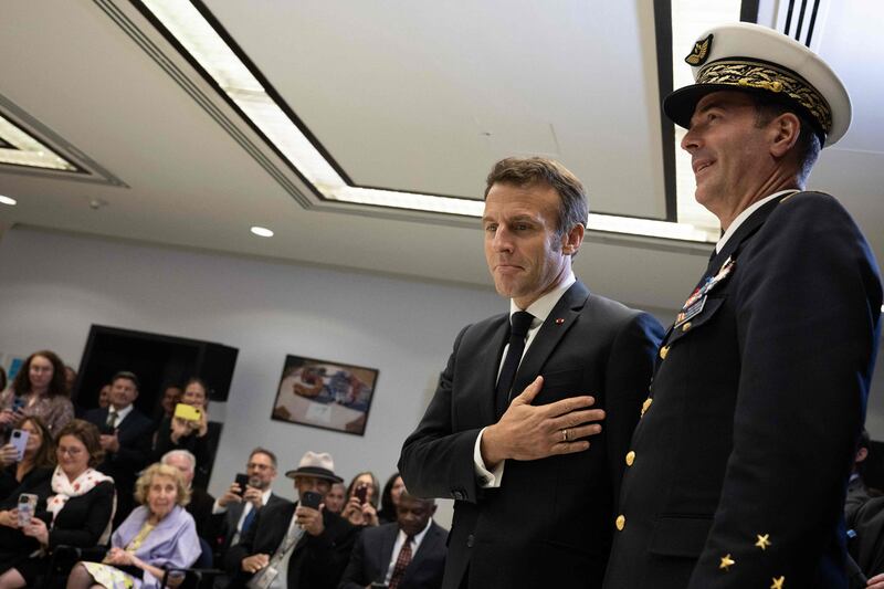 Mr Macron arrives to award the Legion d'Honneur to veterans of the Second World War at the French embassy. AFP