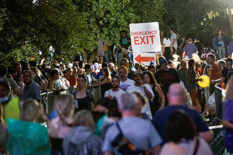 People exit the field as severe weather approaches the area after the cancellation of the 'We Love NYC: The Homecoming Concert' at Central Park in New York City. Reuters
