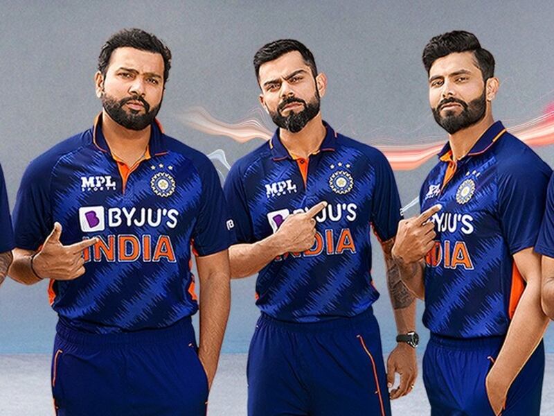 Virat Kohli, centre, and teammates showcase India's 'Billion Cheers Jersey' that the team will wear for the 2021 T20 World Cup in UAE and Oman. Photo: MPL