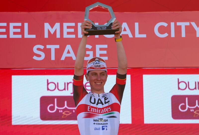 UAE Team Emirates' rider Tadej Pogacar celebrates after winning Stage Four of the UAE Tour. AFP