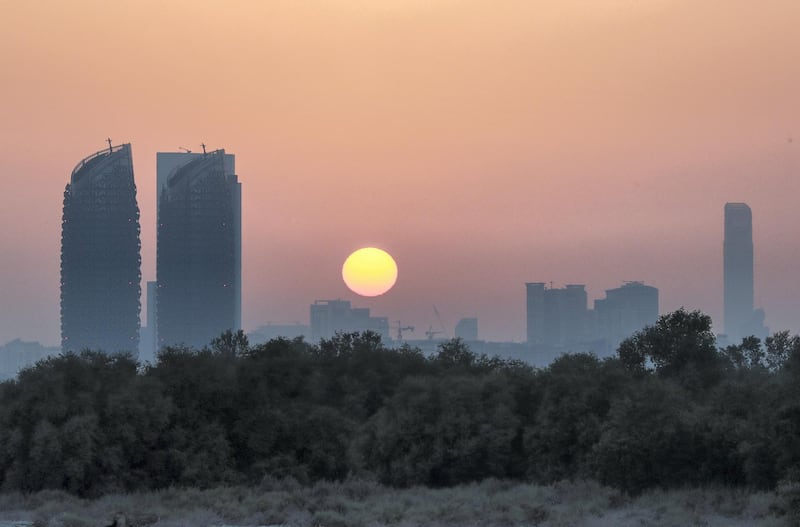Abu Dhabi, U.A.E., June 24, 2018.  Al Reem Island sunset shot from the Eastern Mangroves area on June 21, 2018.Victor Besa / The NationalReporter: Section:  Stock Images