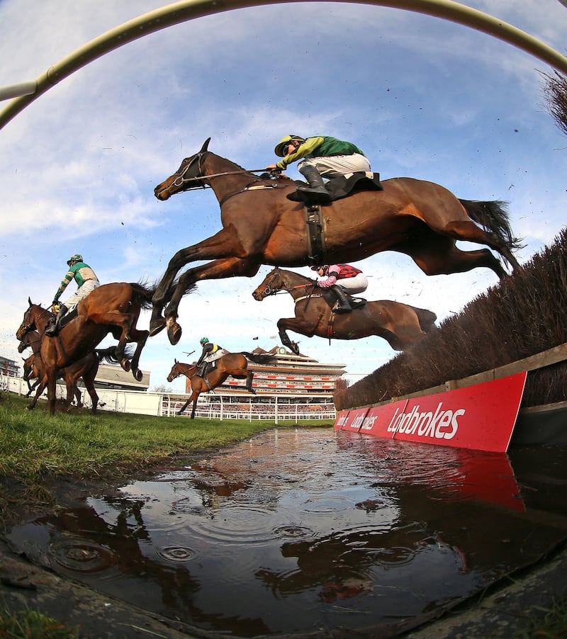 Action from the Sir Peter O'Sullivan Memorial Handicap Steeple Chase at Newbury Racecourse in England on Saturday, November 30. PA