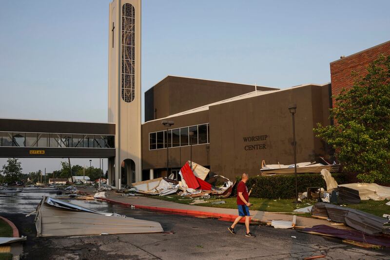 A man views damage at First Baptist Church in Claremore, Oklahoma after powerful storms left a wide trail of destruction Sunday across Texas, Oklahoma and Arkansas. AP