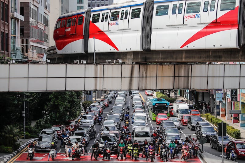 Motorists on a crowded street in Kuala Lumpur. EPA