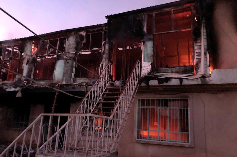 A building belonging to the Patriotic Union of Kurdistan (PUK) is seen after it was burnt during anti-government protests on the outskirt of Sulaimaniyah, Iraq. Reuters