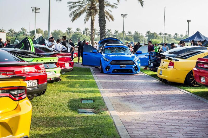 ABU DHABI, UNITED ARAB EMIRATES, 28 OCTOBER 2018 - Different models of modified cars at the Street Meet modified cars event, Abu Dhabi City Golf Club.  Leslie Pableo for The National for Adam Workman's story