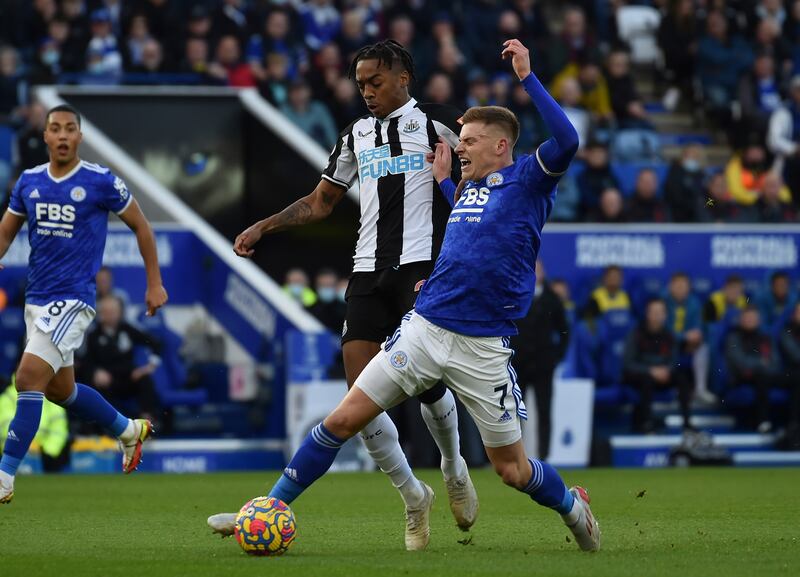 Newcastle's Joe Willlock, left, and Leicester's Harvey Barnes challenge for the ball. AP
