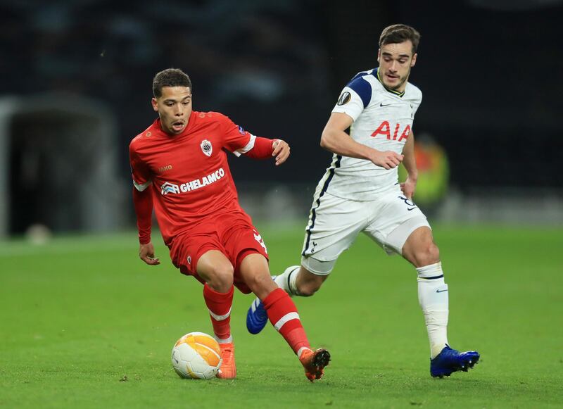 Antwerp's Manuel Benson under pressure from Spurs midfielder Harry Winks. Reuters