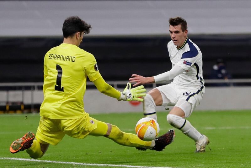Tottenham's Giovani Lo Celso finishes past Antwerp goalkeeper Alireza Beiranvand to make it 2-0. AP