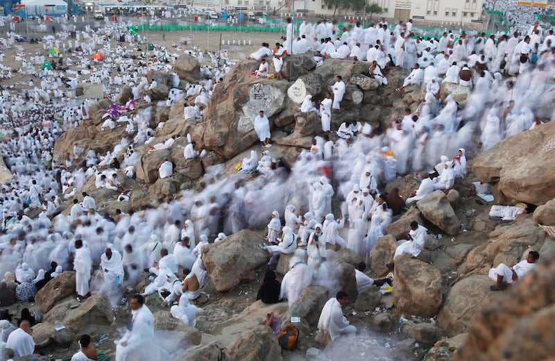 Pilgrims gather at the base of Mount Mercy, on the plains of Arafat, in October 2013. Reuters