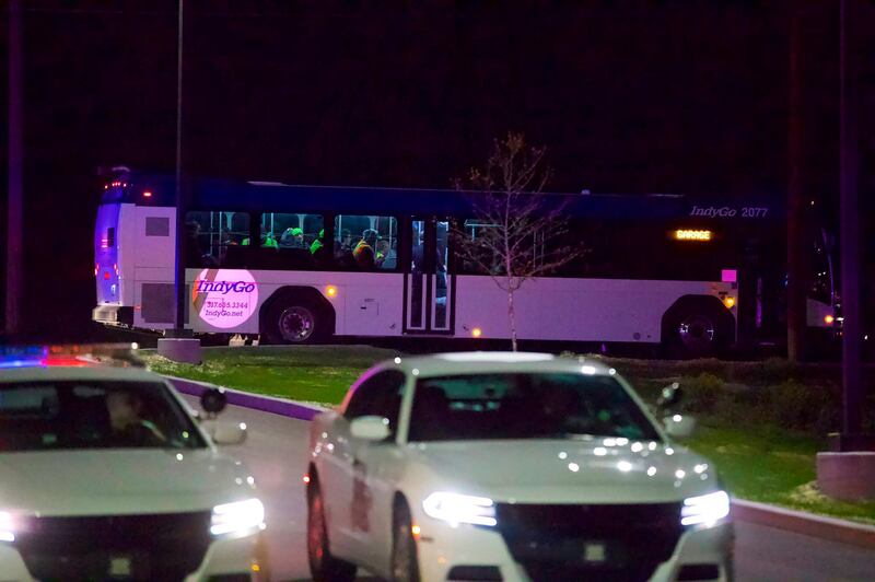 Police arrive at the scene where multiple people were reportedly shot at the FedEx Ground facility. AP Photo