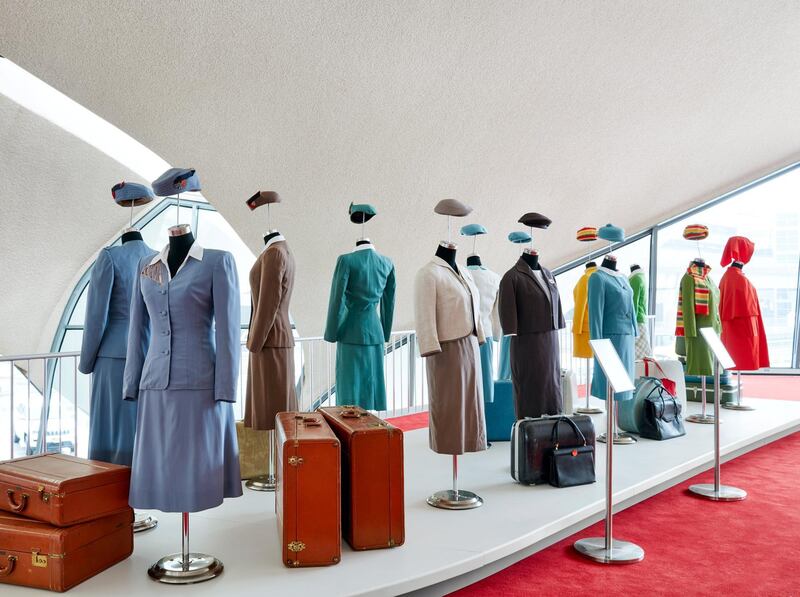 Authentic TWA uniforms — Balmain, Valentino, Stan Herman — are on display. Courtesy TWA Hotel / David Mitchell