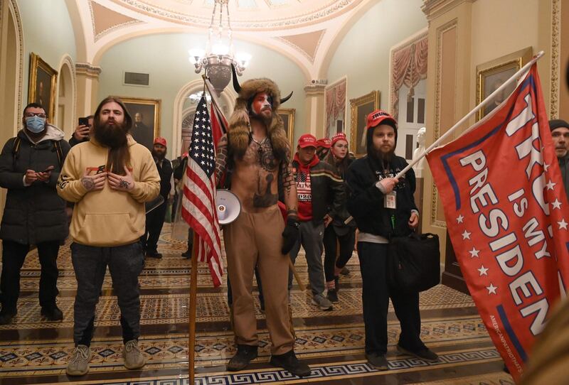 TOPSHOT - Supporters of US President Donald Trump enter the US Capitol on January 6, 2021, in Washington, DC. Demonstrators breeched security and entered the Capitol as Congress debated the a 2020 presidential election Electoral Vote Certification. / AFP / Saul LOEB
