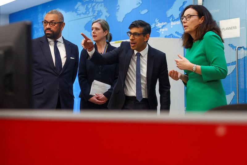 Mr Sunak and Mr Cleverly meet teams co-ordinating the evacuation of British citizens from Sudan at the FCDO Crisis Centre in London in April. Getty Images