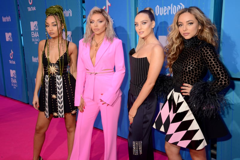 Jesy Nelson, in a pink suit, with her Little Mix bandmates at the MTV EMAs 2018 on November 4, 2018